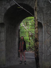 Alice standing in archway at Rivendell